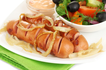 Grilled sausage with fresh salad close up
