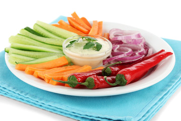 Assorted raw vegetables sticks in plate isolated on white