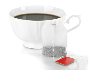 Cup of tea with tea bag solated on white.