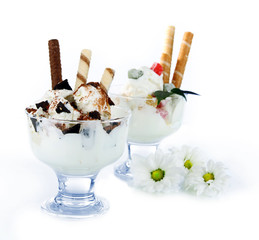 Ice cream with wafer sticks isolated on white