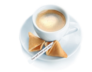 Cup of coffee and fortune cookies, isolated on white
