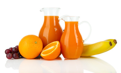 Orange juice in pitchers isolated on white