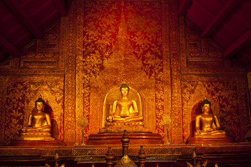 three buddha and art wall temple