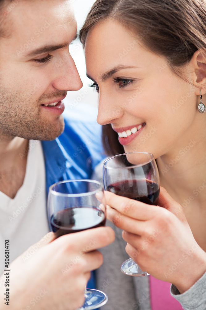 Poster couple drinking wine