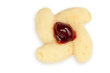 Cookie shaped as flower with preserved cherry in center