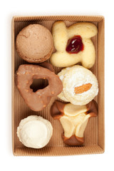 Several kinds of cookies and cakes in open box