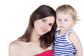 Mother holds little son in striped singlet in her arms