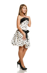 Full length of lovely young girl  in romantic dress