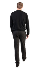 back view of walking  business man.  going young guy