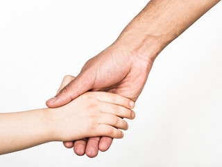 Handshake between white child and black man