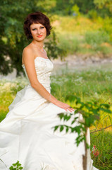 Cute little girl in a wedding dress