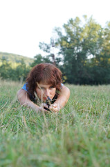 girl with gun on nature