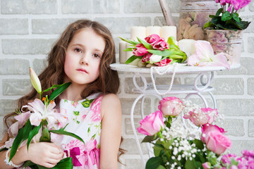 Portrait of a beautiful girl with flowers