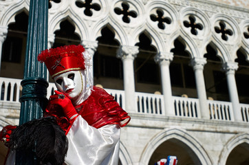 Venetian costume attends Carnival of Venice.