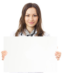 Naklejka premium Happy doctor showing signboard, over white