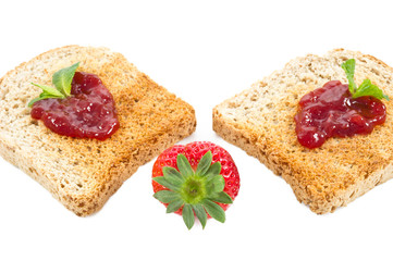 sweet strawberries jam on toast close up