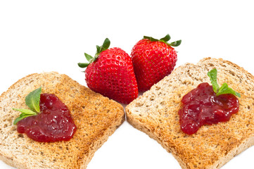 sweet strawberries jam on toast close up