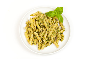 Pasta with pesto sauce, fresh basil and nuts
