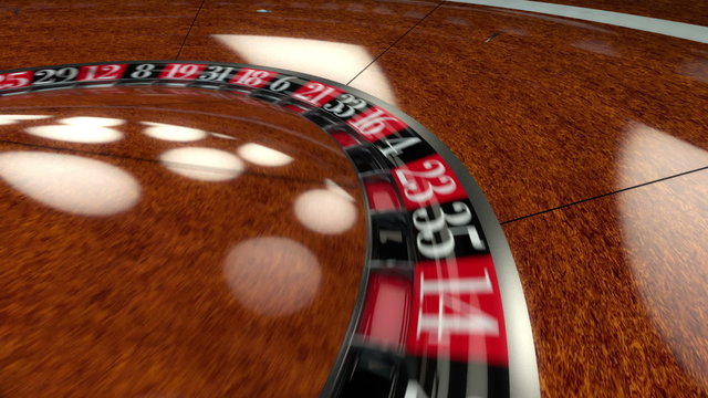 Roulette Wheel spin around landing on green double zero