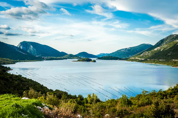 Bay in Croatia on a cloudy day with calm sea