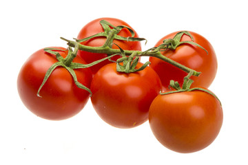 Red ripe tomatoes on the branch