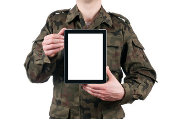 soldier holding blank digital tablet isolated on white backgroun