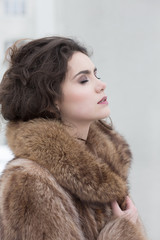 Affectionate Dreamy Sensual Woman in Fur Coat in Reverie. Serene