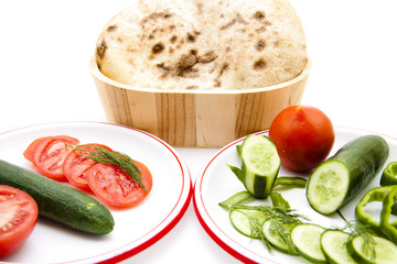 Gurken und Tomatenteller