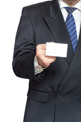 A man holding a business card in his hand
