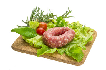 Salami with rosemary, salad and tomatoes