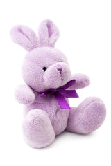 Toys: small pink or lilac rabbit, isolated on white background © Sergey Skleznev