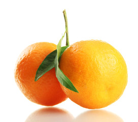 Ripe sweet tangerines with leaves, isolated on white