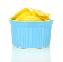 Potato chips in bowl, isolated on white