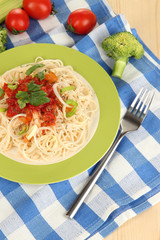 Tasty spaghetti with sauce and vegetables