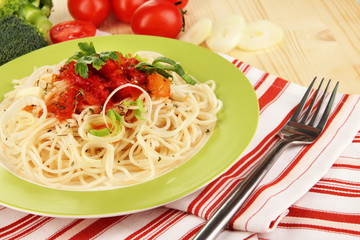 Tasty spaghetti with sauce and vegetables