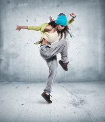 Fotobehang young woman hip hop dancer © Aleksandr Doodko