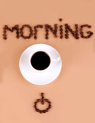 Cup of strong coffee on beige background