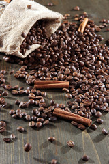 Coffee in  sack on wooden table