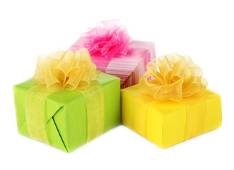 Bright gifts with bows isolated on white