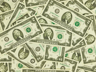 A Pile of Two Dollar Bills as a Money Background