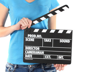 Movie production clapper board in hands isolated on white
