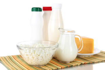Dairy products on napkin isolated on white