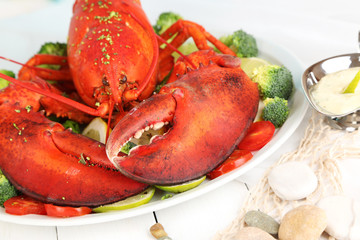 Red lobster on platter on serving table close-up