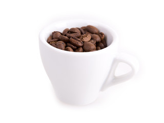 coffee cup and coffee beans on a white background