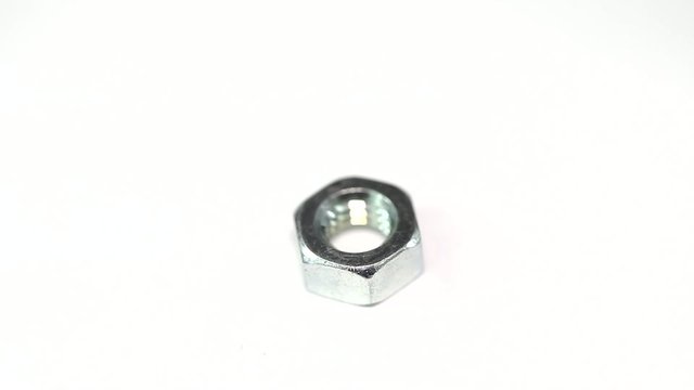 Nut rotates on a white background