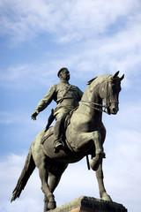 Fototapeta na wymiar Statue of the bronze horseback rider