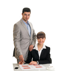 Two business people looking documents