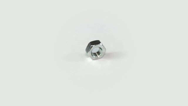 Nut rotates on a white background