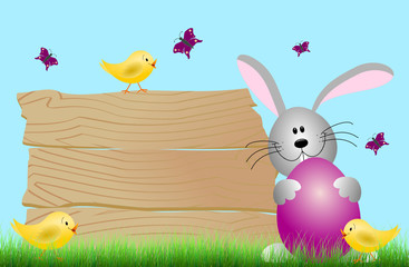 Hase mit Ei und Küken auf Wiese