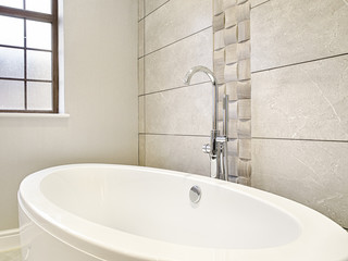 Interior design detail of a Luxury bath tub and faucet